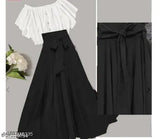 Long skirt with ruffled trim, sleeveless top in white, black waistband
