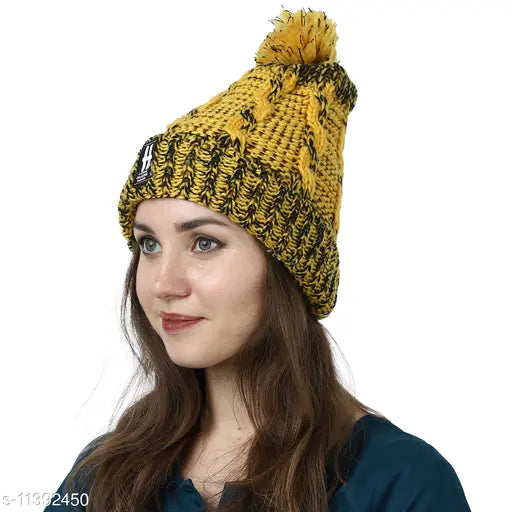 Double-shade yellow and black wool beanie with pom pom top for women