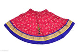 Gold polka dots print rayon lehenga choli in floral style for girls aged 0-7 years, Indian ethnic wear on display