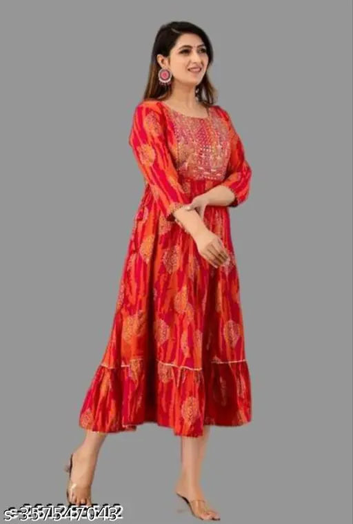 Red embroidered kameez with long anarkali style