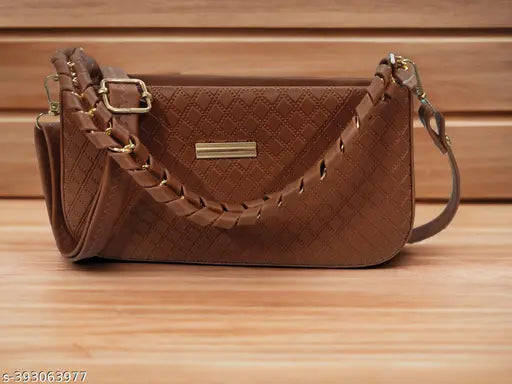 Brown crocodile skin shoulder bag with a gold zip closure
