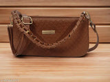 Brown crocodile skin shoulder bag with a gold zip closure