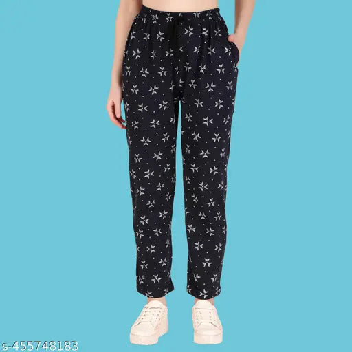 Dark blue women's track pants with star print pattern