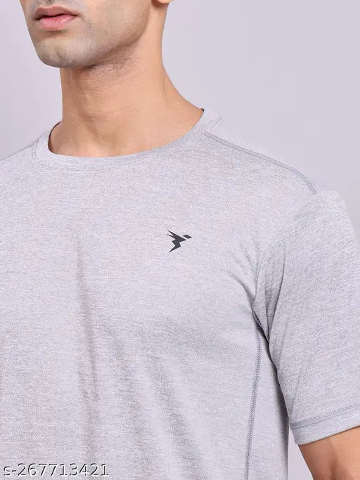 Grey polyester active T-shirt for men, solid round design with short sleeves. Rapid Dry technology enhances comfort and wicks away sweat during workouts. Size L. Made in India