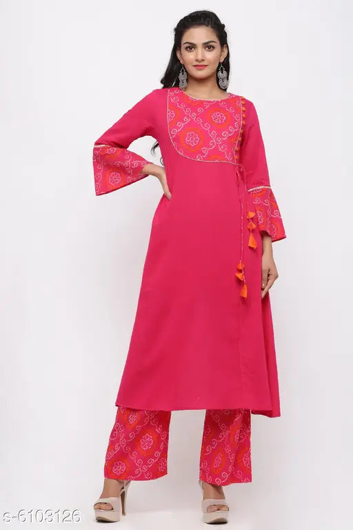 Women's cotton blend A-line printed long kurti with palazzos - vibrant, three-quarter sleeve Indian outfit on display