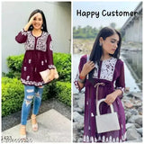 Embroidered georgette short kurtis in wine tone with three-quarter sleeves, ideal for partywear and casual occasions. Made in India." (109 characters)