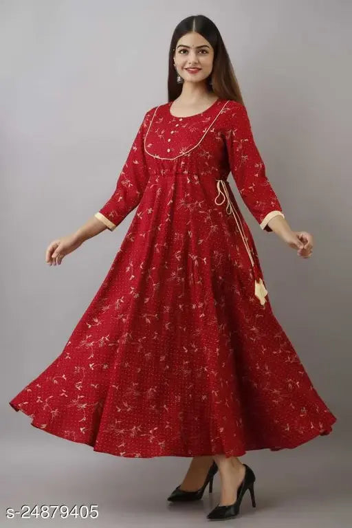 Long red traditional kameez with flared bottom and short sleeve