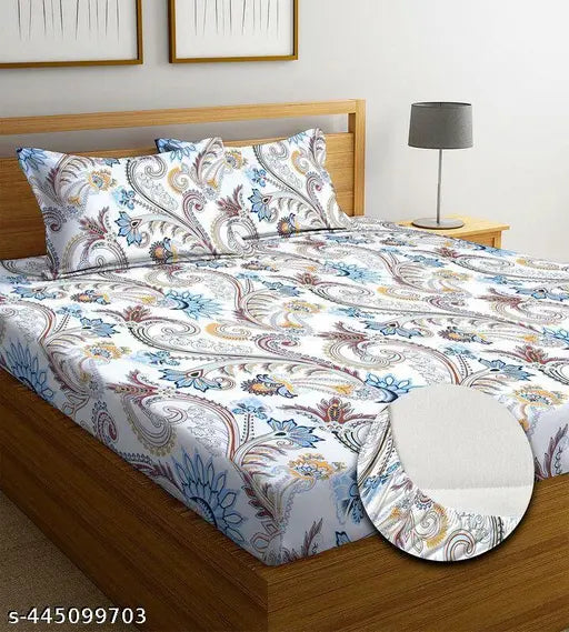 Attractive double fitted cotton bedsheet with 2 large pillow covers, floral print. Ideal for adults during summer season. Made in India