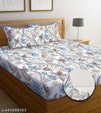 Attractive double fitted cotton bedsheet with 2 large pillow covers, floral print. Ideal for adults during summer season. Made in India