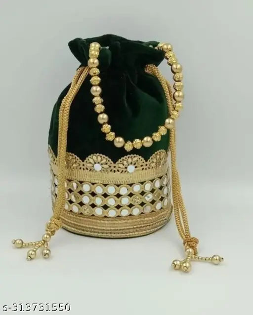 Black velvet clutch with gold chain detail and round bead embellishments