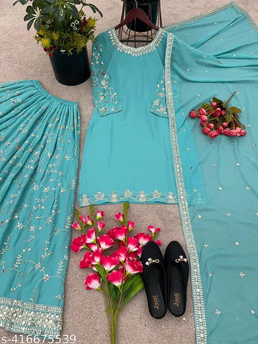 Long turquoise embroidered kameez set with dupatta