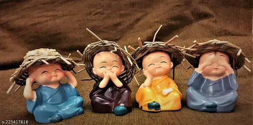 A set of four decorative monk figurines, each with a unique pose and colorful hat. They stand on spring-loaded stands allowing for easy movement. Perfect for home office or car dashboard decoration and as a Valentine's Day gift