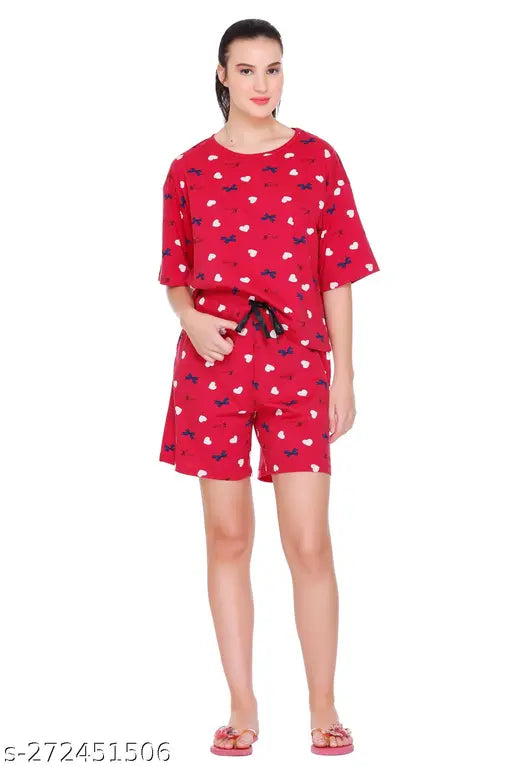 Rose red cotton floral print nightsuit set with top & shorts for women's comfortable sleepwear, featuring round neck, regular fit, and elasticated waistband. Machine washable. Made in India
