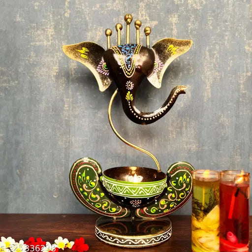 Metal painted Ganesha idol showpiece, Indian crafted iron decor with diya stand for spiritual home decor