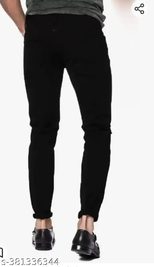 Designer fit denim jeans, black knee cut with solid pattern and slim fit. Size options: 28 (waist 28in, length 40in), 30 (waist 30in, length 40in), 32 (waist 32in, length 40in). Made in India