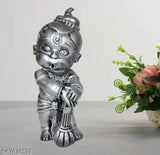 Black metal figurine of childlike deity, resembling Hindu mythological character, intricately designed idol, modern decoration, mother's day gift, vastu and positive energy, trending 2024, vastu object