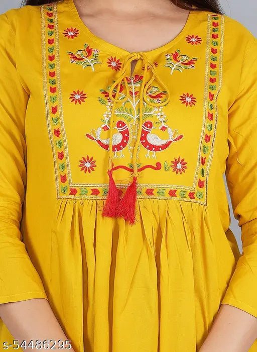 Womens party and festive attire, yellow kurta with embroidered design