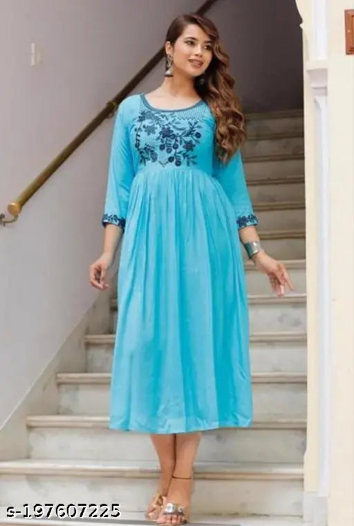 Malti MintBLUE embroidered rayon top with three-quarter sleeves, available in S, L, XL, and XXXL sizes. India-origin fashion clothing on mannequin