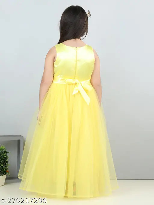 Yellow sequined net gown for kids party wear, embellished with toy balloon motifs on a full-length dress