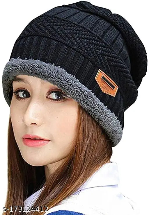 Black wool winter hat with pom-pom