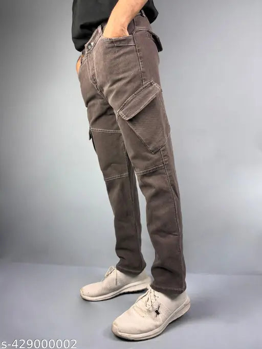 Solid denim, Inner-Pocket Cola cargo jeans for men with six pockets, offering durability and style for everyday wear or rugged activities. (13.5 oz knit fabric, 600-700g, size 28/waist 28in, length 39in, hip 31in, country of origin: India)