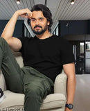 Black Lycra t-shirt, round neck, unisex style by UneeQ for men and women. Solid color with short sleeves, available in sizes S to XXL. Made in India