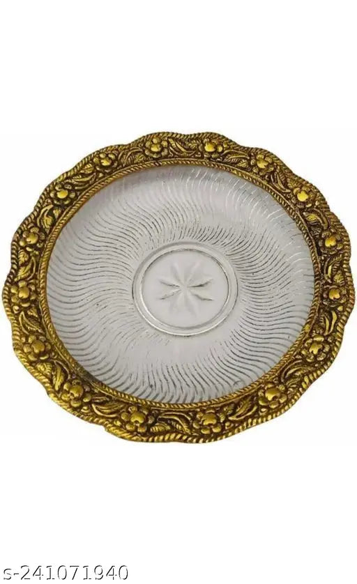 Tortoise shell pattern on round glass plate with metal trim
