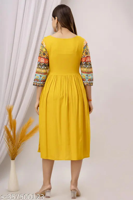 Yellow printed rayon anarkali kurta for women, solid combo with three-quarter sleeves, Indian traditional fashion on mannequin