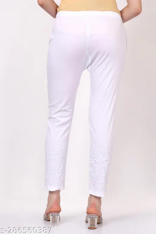 White Lycra pants, stretchy and form-fitting