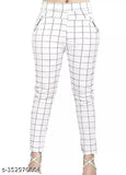 White lycra jeggings with pockets, checked pattern, for working women elevating workwear style and functionality