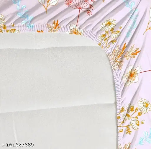 Pink double fitted bedsheet set. Floral print, soft cotton material, 2 pillow covers included.