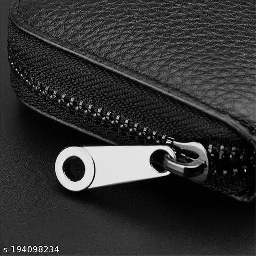 Black leather RFID-blocking cardholder wallet with 11 slots, perfect for both women and men. Compact design fits easily in pockets. Features include custom gift box, secure lock button, and 6-month warranty. Made from premium leatherite material