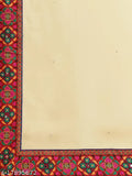 Women's sari with intricate Kutchi embroidery on a dark background, likely cotton or silk fabric