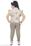 Yellow patterned blouse, denim jeans style pants