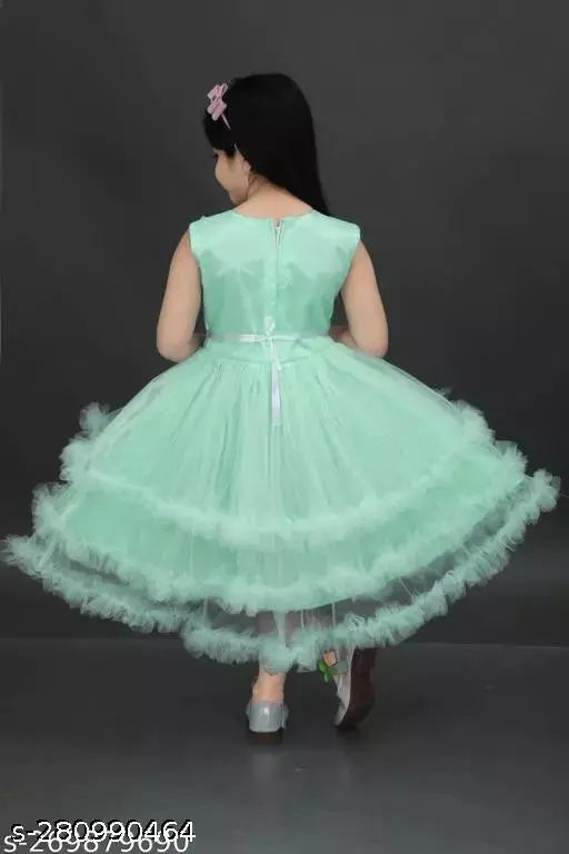 Green ruffled children's dress with matching headband