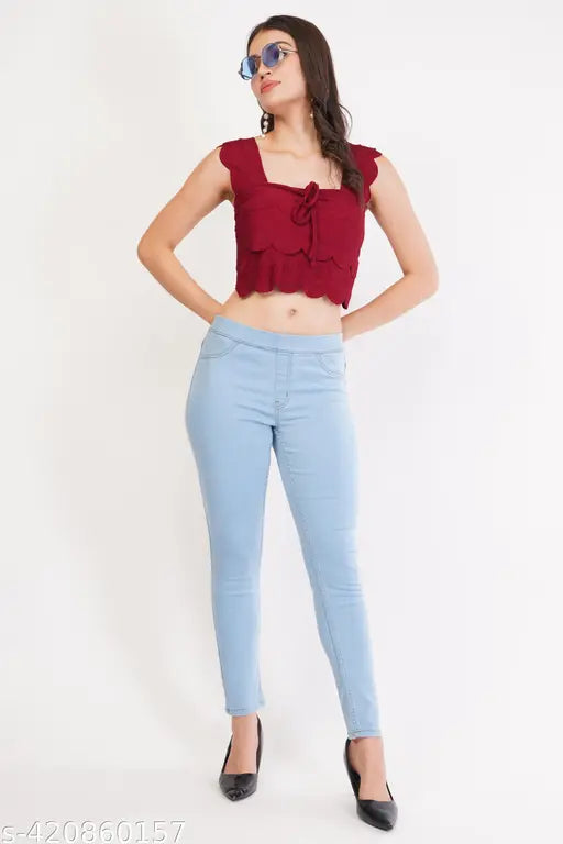 Maroon scalloped edge crop top with square neckline and tie-front detail, made from soft cotton blend fabric. Ideal for warm weather and versatile style in Western wear. Sleeveless design and cropped length pairs well with high-waisted bottoms. Made in India