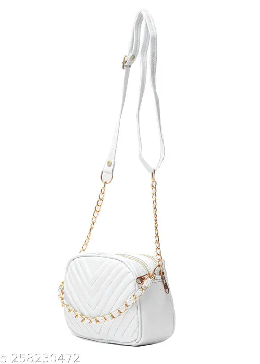 White sling bag with a chain handle for girls
