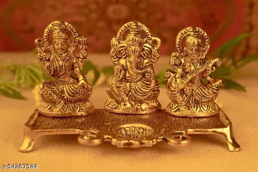 Golden metal idol of Ganesha, Lakshmi, and Saraswati from India, 10cm x 10cm x 20cm single pack