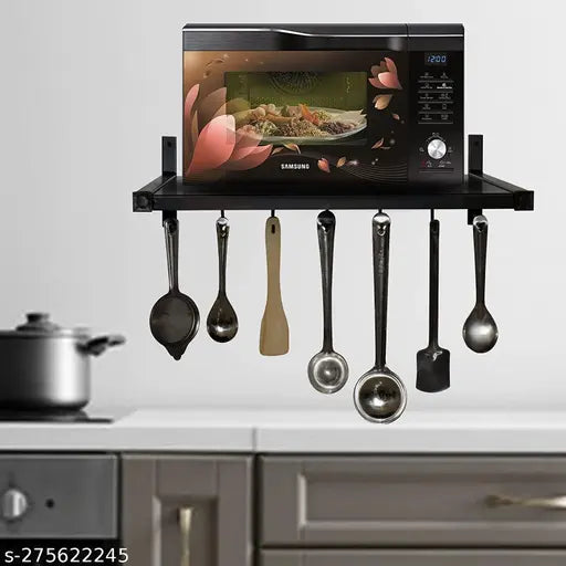 Wall-mounted oven holder with microwave above, accommodates up to 12 pots and pans, space-saving design for compact kitchens