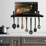 Wall-mounted oven holder with microwave above, accommodates up to 12 pots and pans, space-saving design for compact kitchens