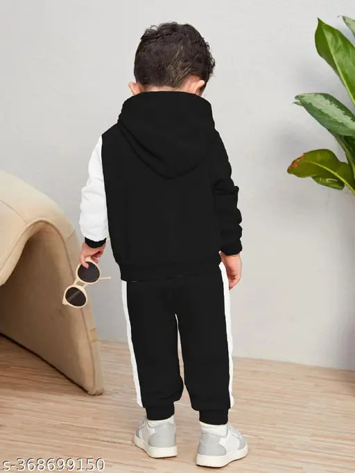 Cotton printed sweatshirt and track pant set for kids, solid bottom in various winter sizes from India