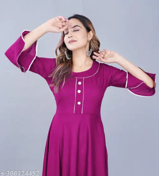 Pink rayon women's anarkali kameez with flared kurties
