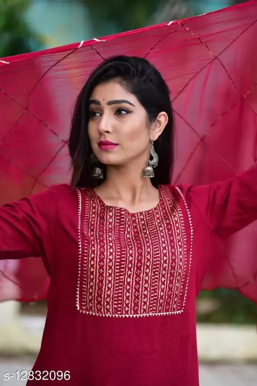 Red and black patterned women's party kurta set with sharara