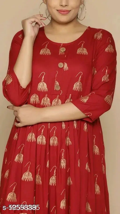 Maroon rayon gown with gold printed kurta, three-quarter sleeves, Indian fashion on mannequin