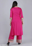 Rayon gold print kurta paazzo set, three-quarter sleeve Indian fashion with printed net pattern on display
