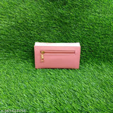 Pink leather cardholder with multiple slots, zip closure