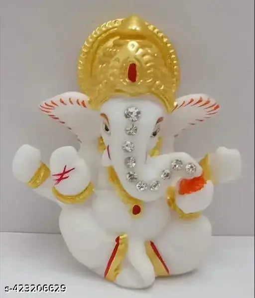 Handcrafted Lord Ganesha idol for car dashboard & home decor, Ram Lalla Handicraft. Double-sided tape included for easy placement. Religious art form, ideal for gifts and home/office decoration. Size: 2x1x6.5 cm