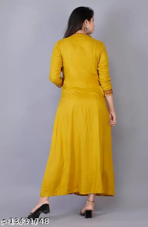 Yellow rayon embroidered kurti with three-quarter sleeves, ideal for women's fashion. India origin