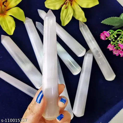 Crystal healing massager wand with selenite point tip, used for Reiki healing