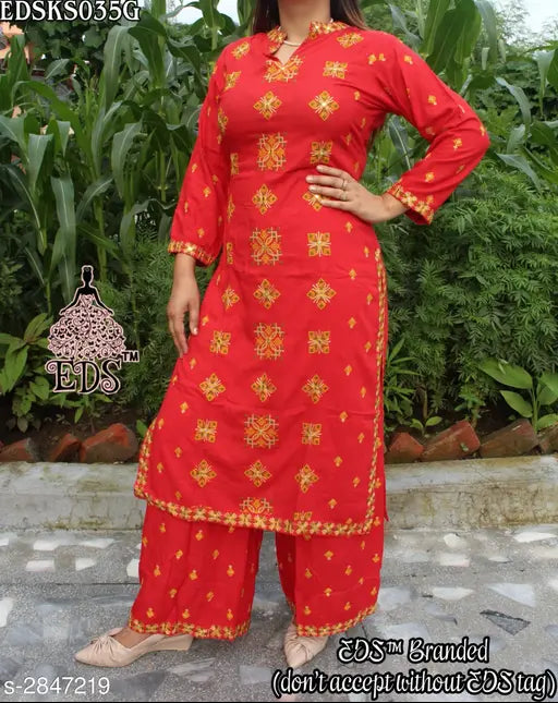 Women's printed rayon slub kurta with palazzo pants, three-quarter sleeves, colorful net print
